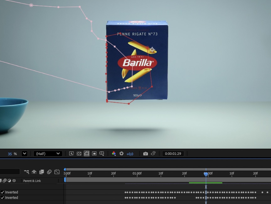 Editing software: a mask drawn around the floating Barilla box, with keyframes on the timeline below